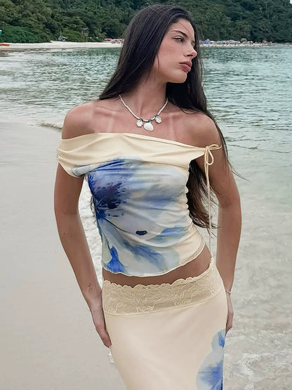 The Latif Asymmetric Shoulder Top & Slanted strappy boulder skirt Two-piece Set